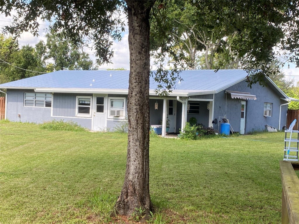 Photo of 6604 Deleon Ave, Fort Pierce, FL 34951 (MLS # F10409370)