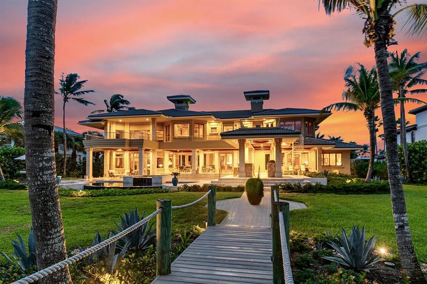 Sensational oceanfront estate in prestigous Sailfish Point boasts 140' direct waterfrontage on .94 acres with sweeping views of the ocean.  This spectacular modern home showcases double height ceilings over a grand living rm. and custom 
bar perfect for entertaining.  The remodeled kitchen is a chef's delight! The downstairs features two spacious oceanfront ensuite bedrooms for your guests enjoyment.  Custom iron/wooden staircase takes you to the 2nd floor master suite w/expansive closet space & private terrace, 2 guest ensuite bedrooms, media rm., and office.  Elevator.  Experience magnificent 2nd flr. views of the ocean from both master & guest suites.  Updated Creston system.  4 car environmentally controlled garage with room for golf carts. Cabana bath. Private entry walkway to beach. This home comes fully furnished inclusive of a beautiful Pramberger piano for your enjoyment.  Sailfish Point Club offers a Marina & Yacht club for up to 125 ft. yacht, Jack Nicklaus golf course, first class fitness & spa, exquisite Members dining club.

Oceanfront living with a world class experience.  This palatial residence is a Florida delight and must See!