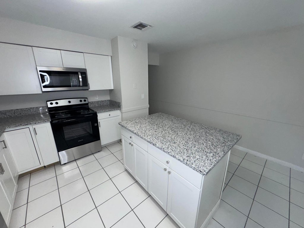 Photo of 3854 Van Cott Street #3854, West Palm Beach, FL 33403 (MLS # B26042767)