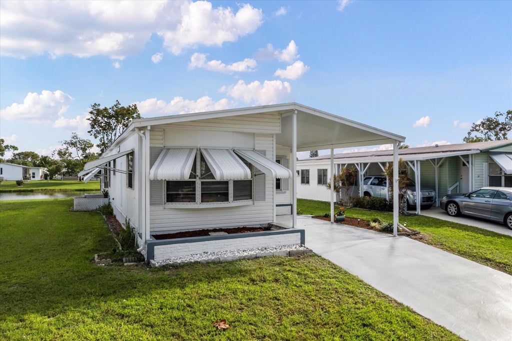 Photo of 23 Oliva Road, Port Saint Lucie, FL 34952 (MLS # R11000861)