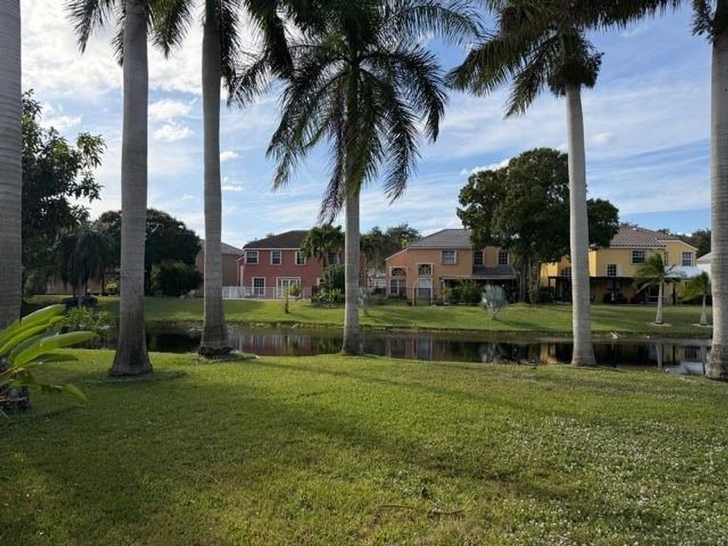 Photo of 360 NW 115th Way, Coral Springs, FL 33071 (MLS # F10539090)