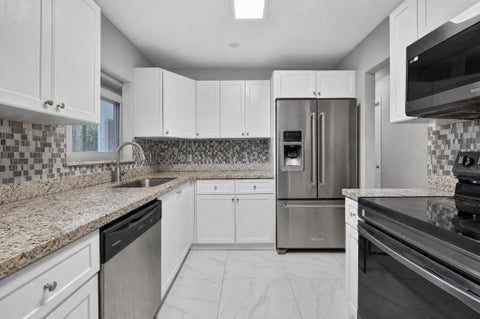 Tiny photo for 741 NW 17th Court, Pompano Beach, FL 33060 (MLS # B26048601)