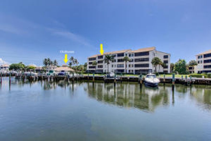 :Do not miss this spectacular 2 bedroom and 2 bathroom waterfront condo with direct intracoastal views from almost every room. Fantastic floor plan with the kitchen open to the direct living space and direct water view. The patio has been enclosed and is an extension of the living space. This community is located on the intracoastal between PGA and Donald Ross so by boat it is a quick 20 minutes to ocean access. Oak Harbour is a manned gated community and has a clubhouse on the water with a huge patio, 2 day docks and an exercise room. There are 2 community pools and tennis courts.