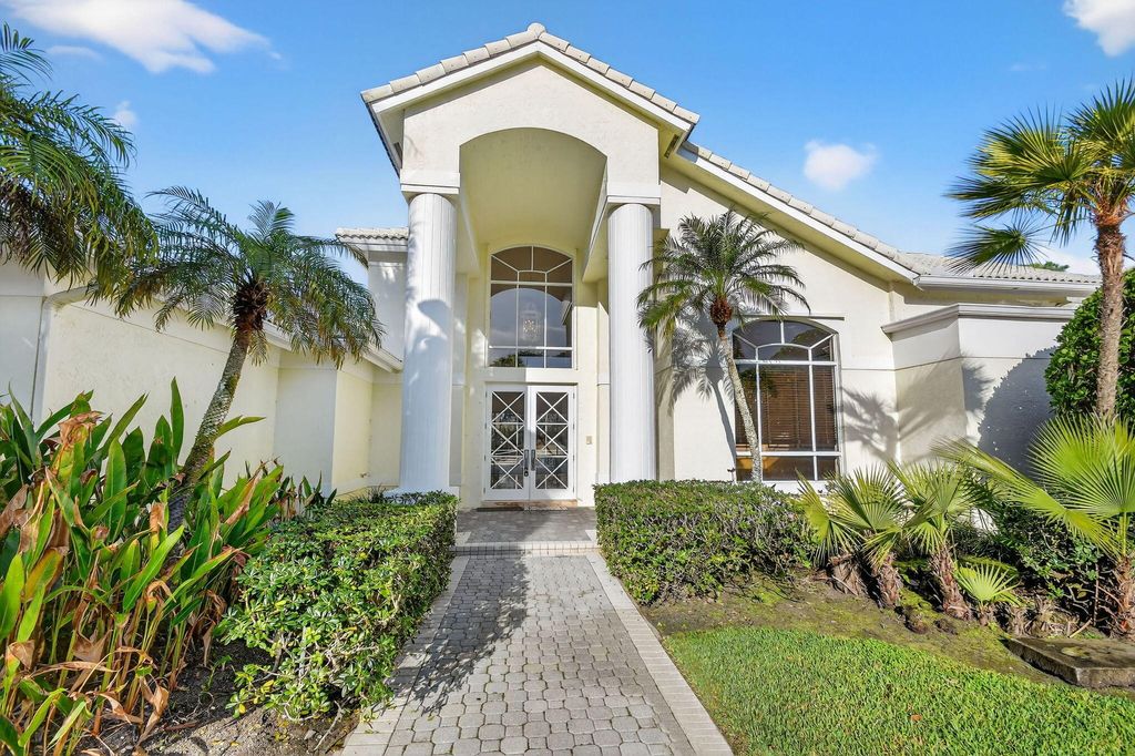 Photo of 1711 Breakers West Boulevard, West Palm Beach, FL 33411 (MLS # B26003100)