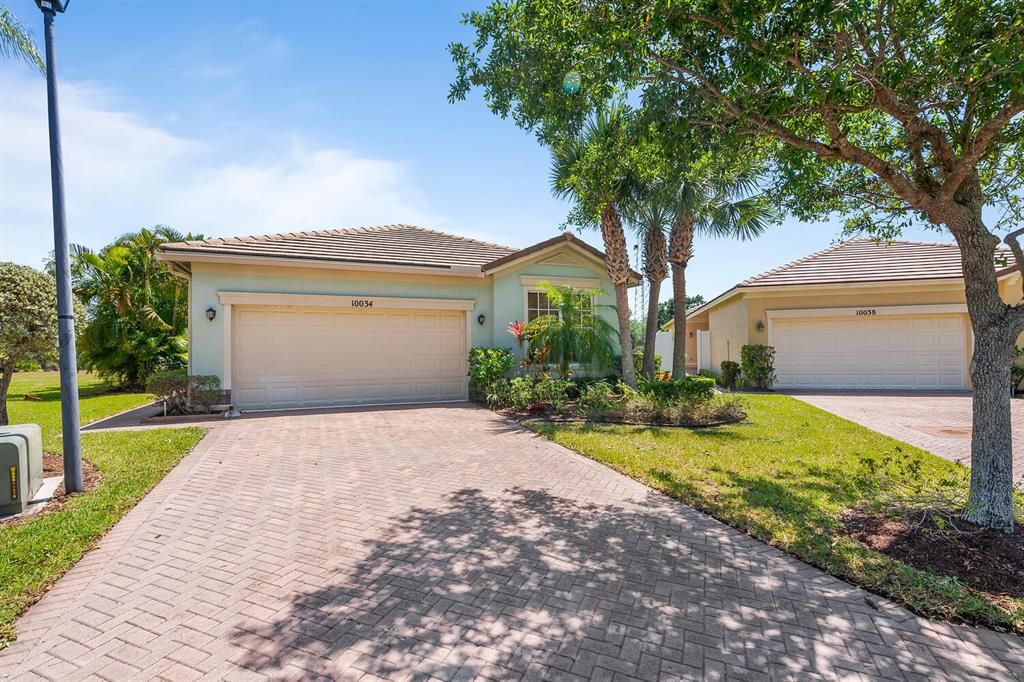 Photo of 10034 SW Chadwick Drive Dr, Port St Lucie, FL 34987 (MLS # R10709369)