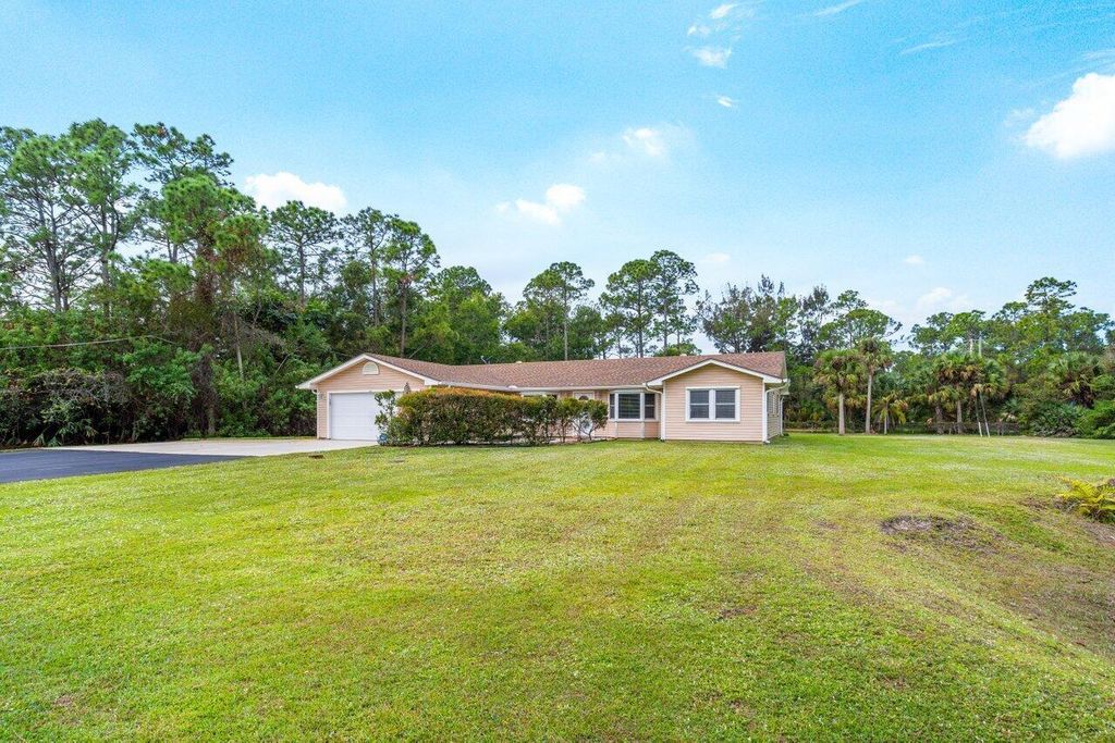Photo of 17629 133rd Trail N, Jupiter, FL 33478 (MLS # R10940493)