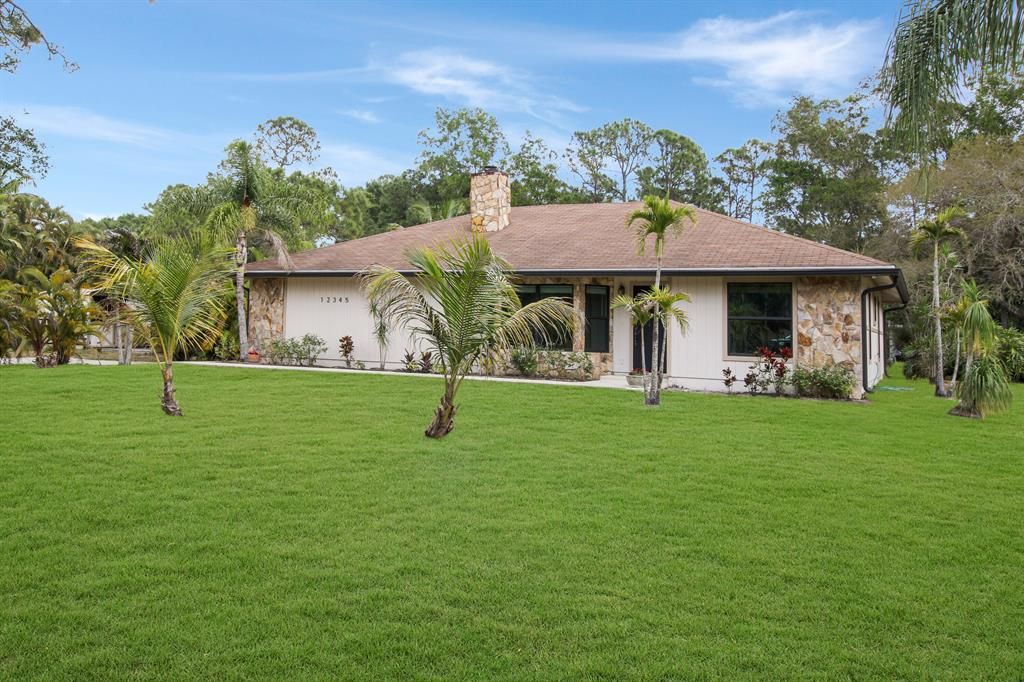 Photo of 12345 Randolph Siding Road, Jupiter, FL 33478 (MLS # R10883830)