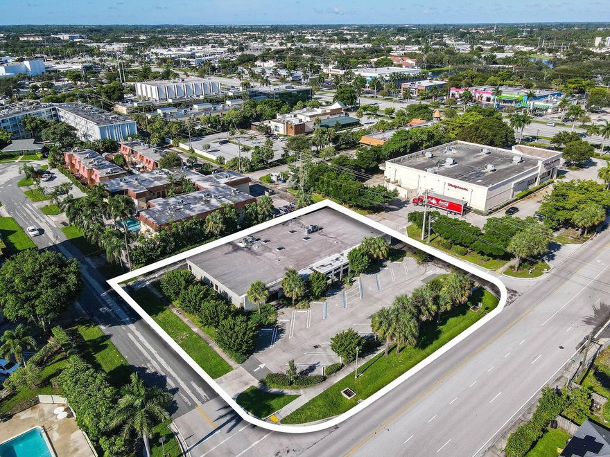 Stand alone flex office building for sale, just minutes from I-95 & Palm Beach Lakes Blvd in West Palm Beach. Buildout includes private offices, conference rooms, workstations, lounge areas, flexible meeting zones, kitchen, restrooms, and ample parking. Perfect for professional, creative, or flex uses, with the option to divide into three self-contained office areas for flexibility. Sleek, contemporary design and move-in ready. Ideal Owner User or Investment Opportunity