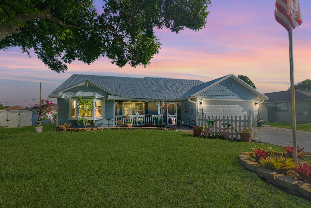 Photo of 2309 SW FERN Circle, Port Saint Lucie, FL 34953 (MLS # B26053608)