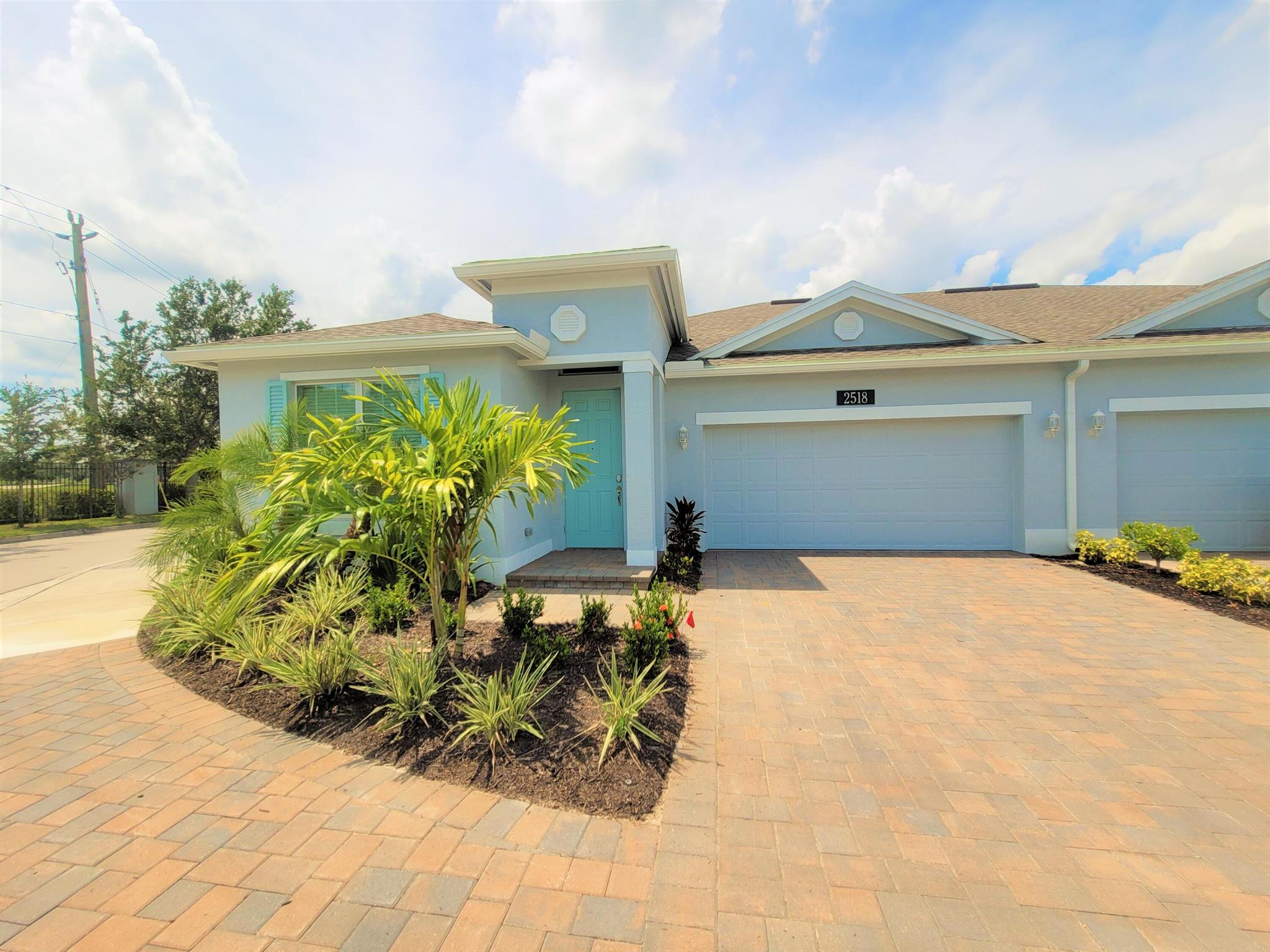 Annual unfurnished rental. Available for new residents on 07/10/2024. Built 2022, gently lived in beautiful lake front villa in Bella Vista Isles. It's gorgeous! Split floor plan, 3 bedrooms, 2 baths, 2 car garage, large kitchen island, impact windows, crown molding, beautiful light fixtures and fans. Tile throughout. Calming water views from back porch. Fabulous central location, behind Indian River Mall, a short distance to the Free IRT GoLine bus stop just behind Indian River Mall, close by movie theaters, shopping, restaurants, medical and just minutes to sandy beaches. Landscaping included in the monthly rent. Small Pets considered per owner's approval. This gated community offers a Community Pool.