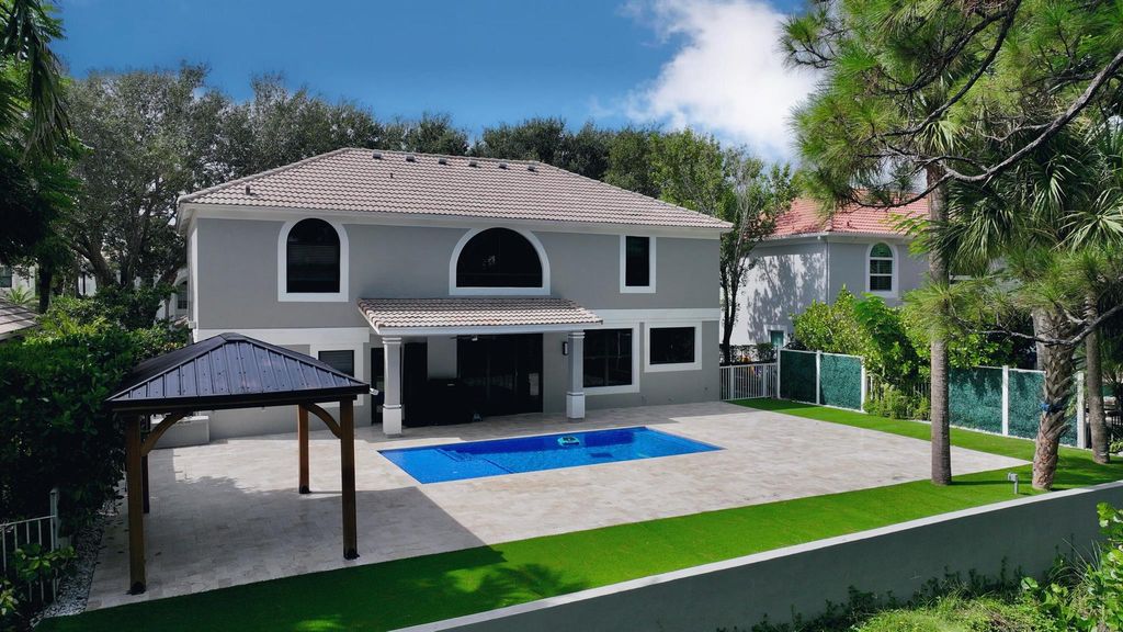 Photo of 212 Lone Pine Drive, Palm Beach Gardens, FL 33410 (MLS # R11121315)