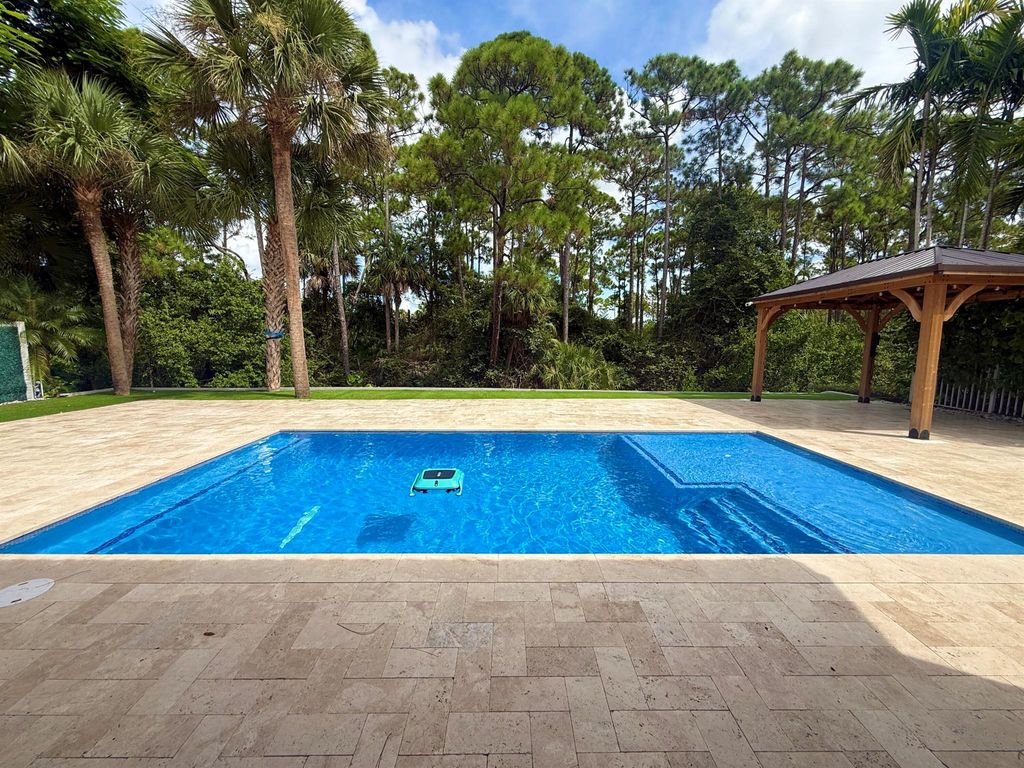 Photo of 212 Lone Pine Drive, Palm Beach Gardens, FL 33410 (MLS # R11121315)