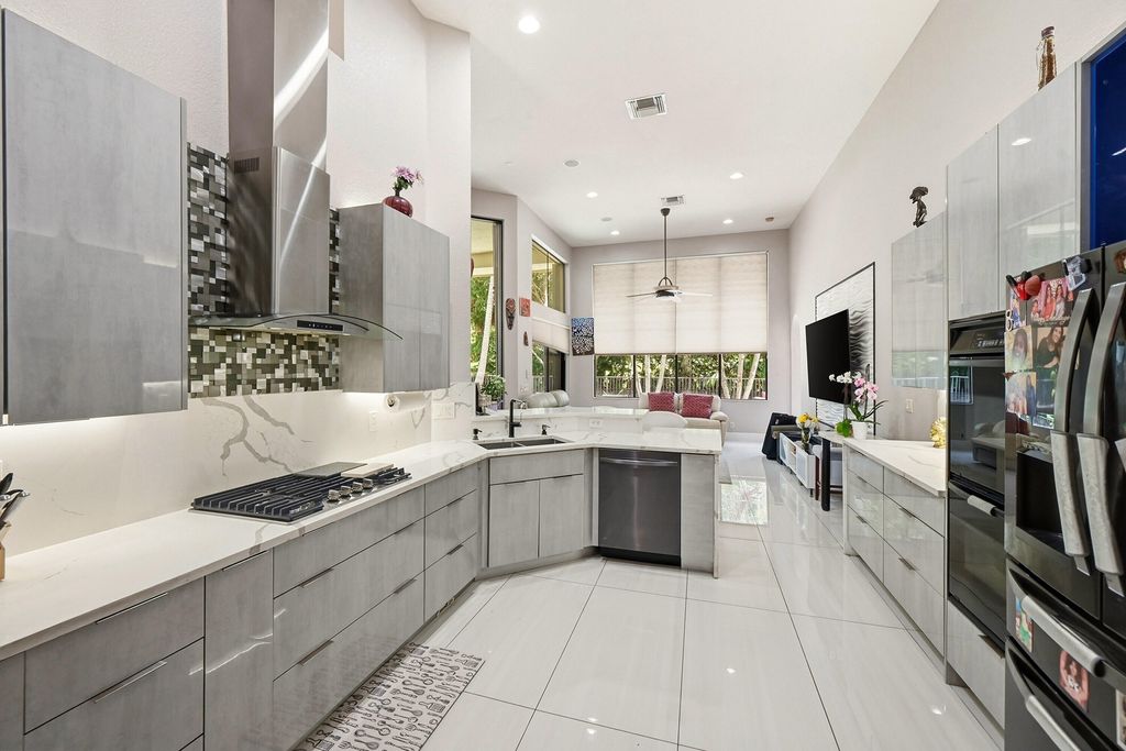 Photo of 10340 Trianon Place, Wellington, FL 33449 (MLS # B26031872)
