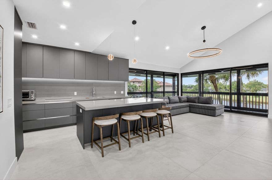 Welcome to Boca West Country Club. Come see this totally renovated 3-bedroom, 3-bath residence with spectacular golf course views. This move-in-ready home features high-end appliances, full impact sliders and windows, porcelain floors, LED lighting, and beautiful designer finishes throughout. Enjoy indoor-outdoor living with a wraparound terrace overlooking the golf course, perfect for relaxing or entertaining. The third bedroom is an ensuite retreat with an incredible upstairs patio, also capturing sweeping golf course views. A rare opportunity to own a beautifully updated home in one of Boca Raton's premier private country club communities. This home is not to be missed.
