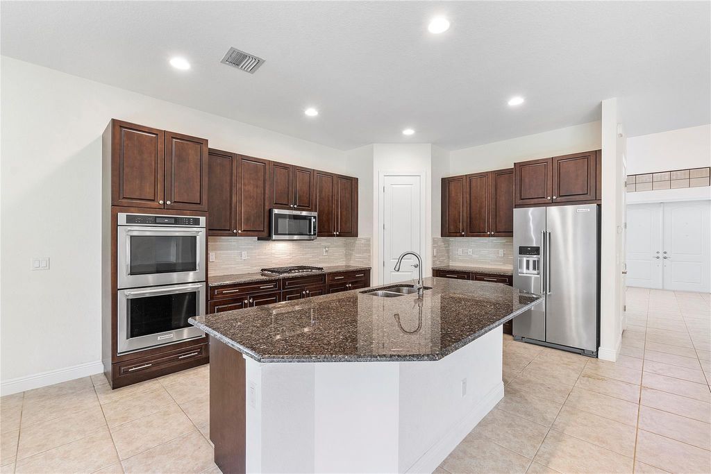 Photo of 11620 NW 83rd Way, Parkland, FL 33076 (MLS # F10485067)