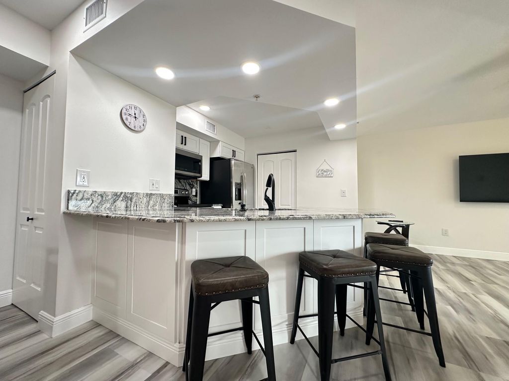 Photo of 3744 NW Adriatic Ln #307, Jensen Beach, FL 34957 (MLS # F10507637)