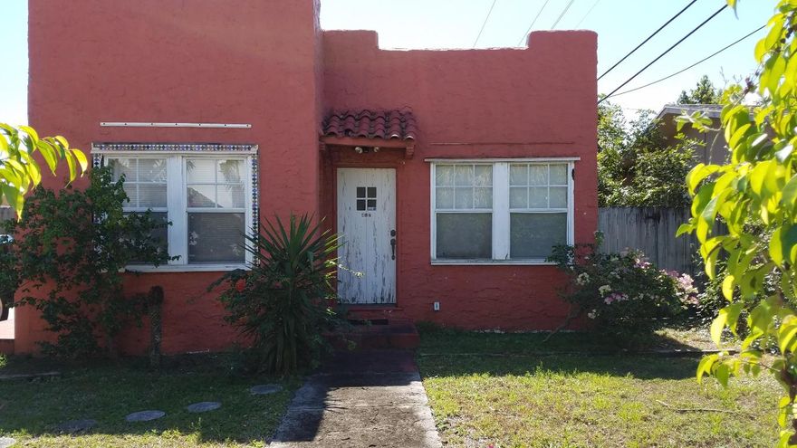 Beautiful Mediterranean style single family home that is a 2/1 with a 2/1 garage apt also. The detached  2 car garage could be converted to a workshop easily. There are impact windows for the house that are being left in garage as part of the purchase.