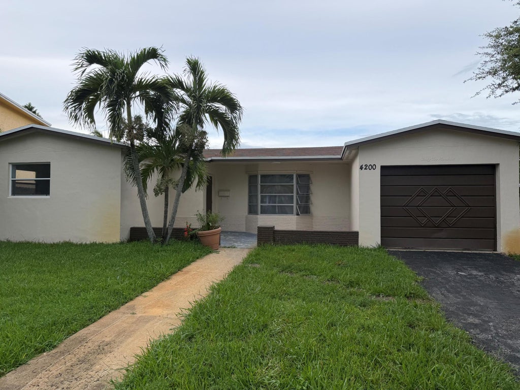 Photo of 4200 NW 37TH Terrace, Fort Lauderdale, FL 33309 (MLS # B26057714)