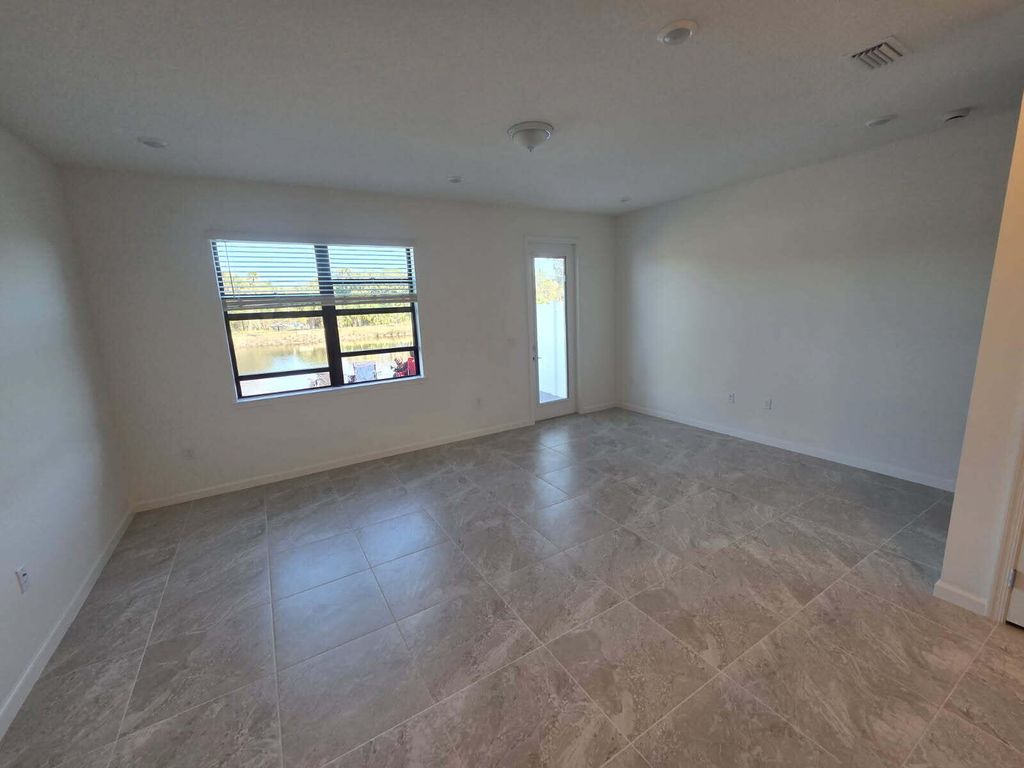 Photo of 7783 SW Bentley Lane, Stuart, FL 34997 (MLS # B26010332)