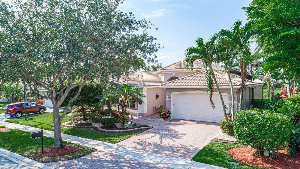 Photo of 7530 Tarpon Cove Circle Cir, Lake Worth Beach, FL 33467 (MLS # R10795644)