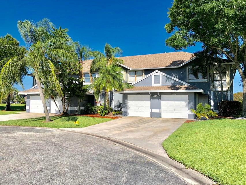 This is the home you have been looking for! This beautiful 3 bed 2.5 bath townhome features various upgrades and its move-in ready! Upgraded kitchen with all stainless steel appliances, updated bathrooms, beautiful floors all throughout the home and an attached garage plus driveway for up to two cars! Master bedrooms features beautiful updated bathroom with large walk-in closet. Half bath down stairs. The home also has accordion shutters. Lovely quiet neighborhood with a pool overlooking the lake and tennis courts! Hoa fees cover building insurance as well as roof maintenance! Ready for you to just bring your belongings and make it your home!