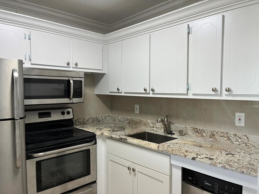 Gorgeous, newly renovated waterfront apartment located in Sterling Village. Enjoy stunning Intracoastal views from your screened in private patio and watch the boats go by. This  community offers Olympic-size pool, clubhouse that has been completely revamped offering state of the art Gym, game room and so much more. water , basic cable internet, and use of all amenities are included in the rent. Steps to banana Boat, Two Georges and just over the bridge to The Beach!