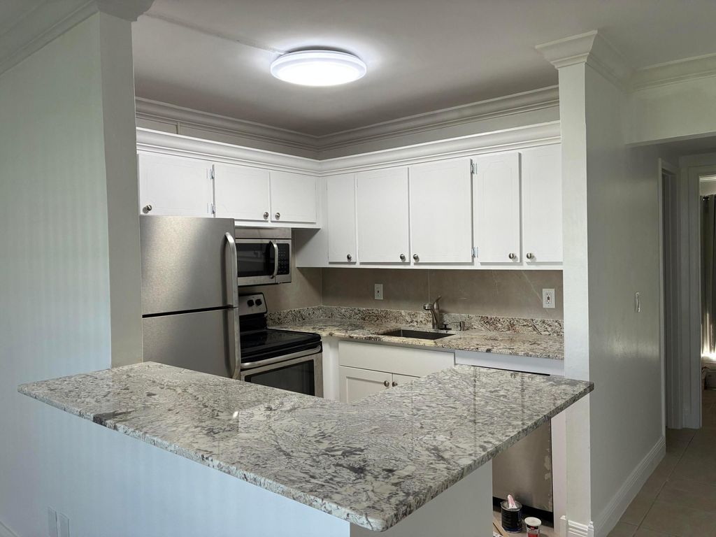 Photo of 650 Horizons Avenue E #107, Boynton Beach, FL 33435 (MLS # R11150927)
