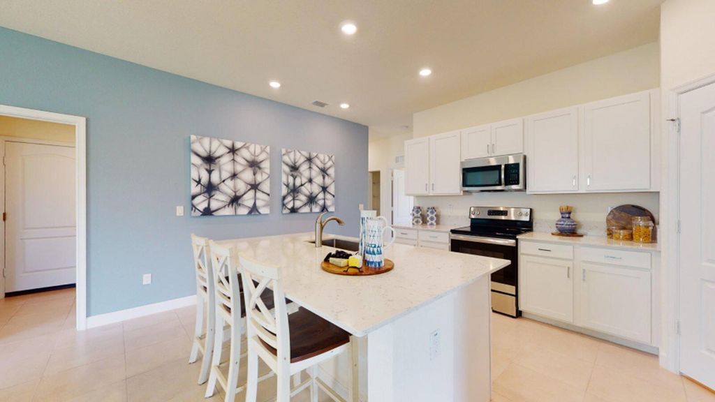 Photo of 6002 NW Pickering Drive, Port Saint Lucie, FL 34987 (MLS # R11042195)