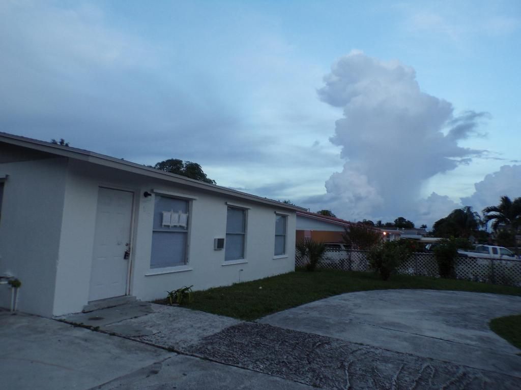 Photo of 1572 W 31st Street, Riviera Beach, FL 33404 (MLS # R11137510)