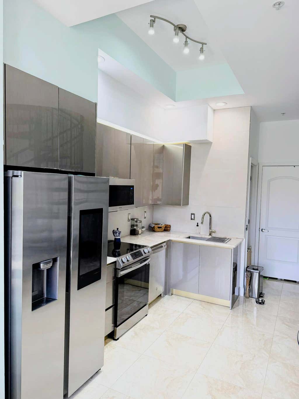Photo of 801 S Olive Avenue #403, West Palm Beach, FL 33401 (MLS # B26065941)