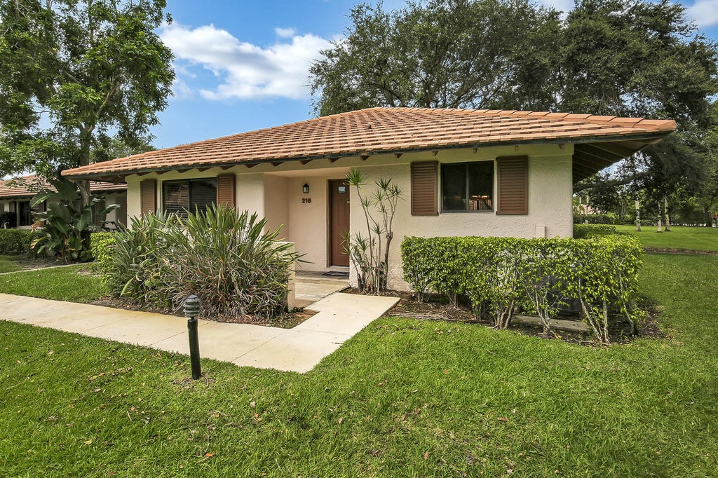 Photo of 216 Club Drive #216, Palm Beach Gardens, FL 33418 (MLS # R10796377)