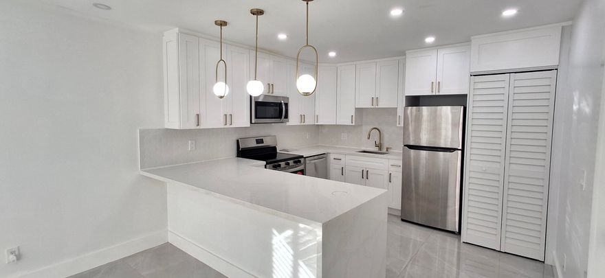 This is a beautiful, fully renovated home, open kitchen with gorgeous quartz, a bathroom with double sinks, washer and dryer. Nice front patio, fully fenced with synthetic grass, making it easy to maintain. Location, Location, Location!!! Walking distance from the Hollywood Young Circle, great restaurants, easy access to Hollywood Beach, and Excellent schools! Water is included. Must see it! The unit is conveniently located in the back alley between Van Buren St. and Jackson St. The unit is conveniently located in the back alley between Van Buren St. and Jackson St.  Requirements, First and security, tenant screening, proof of income  From Hollywood Blvd, go south on 16th Ave, turn left onto the alley between Van Buren St and Jackson St, go straight, 5th house on the left "1534"