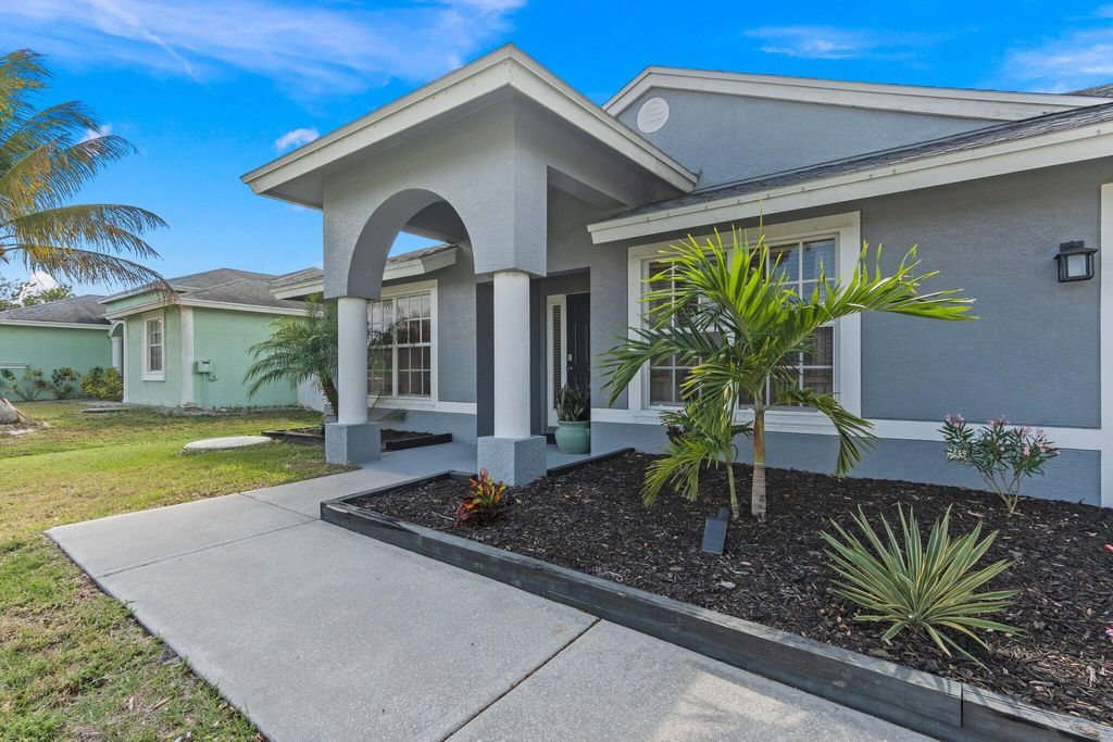 Photo of 3590 SW Voyager Street, Port Saint Lucie, FL 34953 (MLS # R10972911)