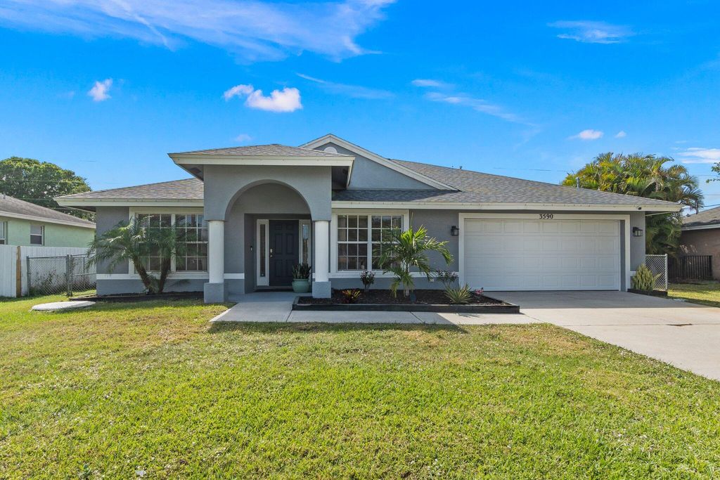 Photo of 3590 SW Voyager Street, Port Saint Lucie, FL 34953 (MLS # R10972911)