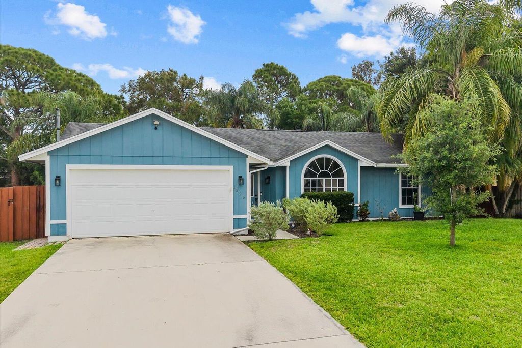Photo of 1325 SW Dorchester Street, Port Saint Lucie, FL 34983 (MLS # B26021119)