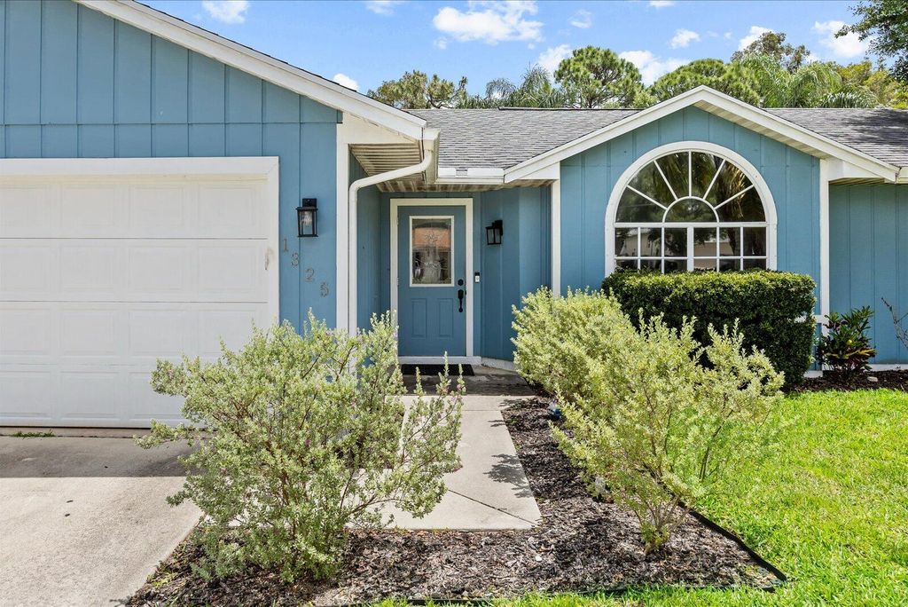 Photo of 1325 SW Dorchester Street, Port Saint Lucie, FL 34983 (MLS # B26021119)