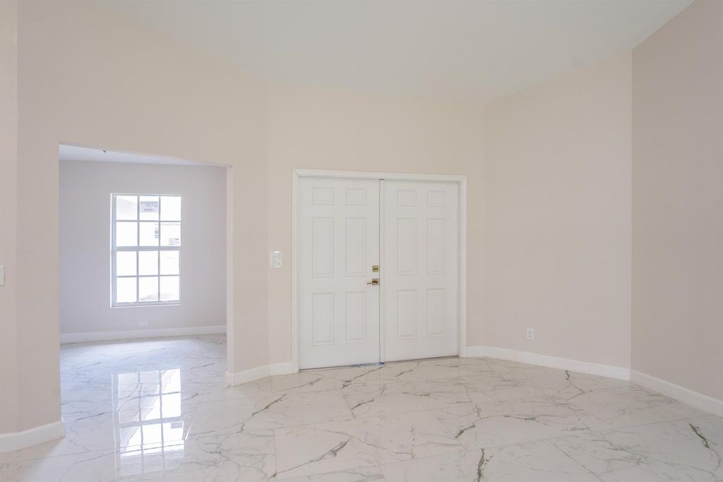 Photo of 1673 SW Levato Avenue, Port Saint Lucie, FL 34953 (MLS # R11005110)