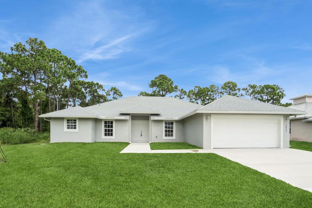 Photo of 1673 SW Levato Avenue, Port Saint Lucie, FL 34953 (MLS # R11005110)