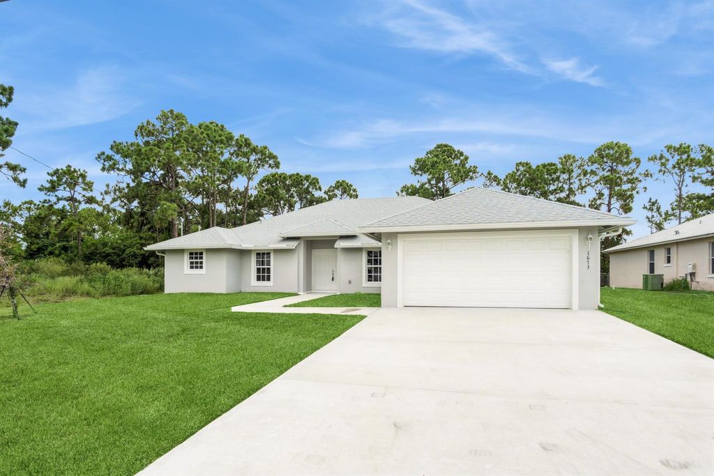 Photo of 1673 SW Levato Avenue, Port Saint Lucie, FL 34953 (MLS # R11005110)