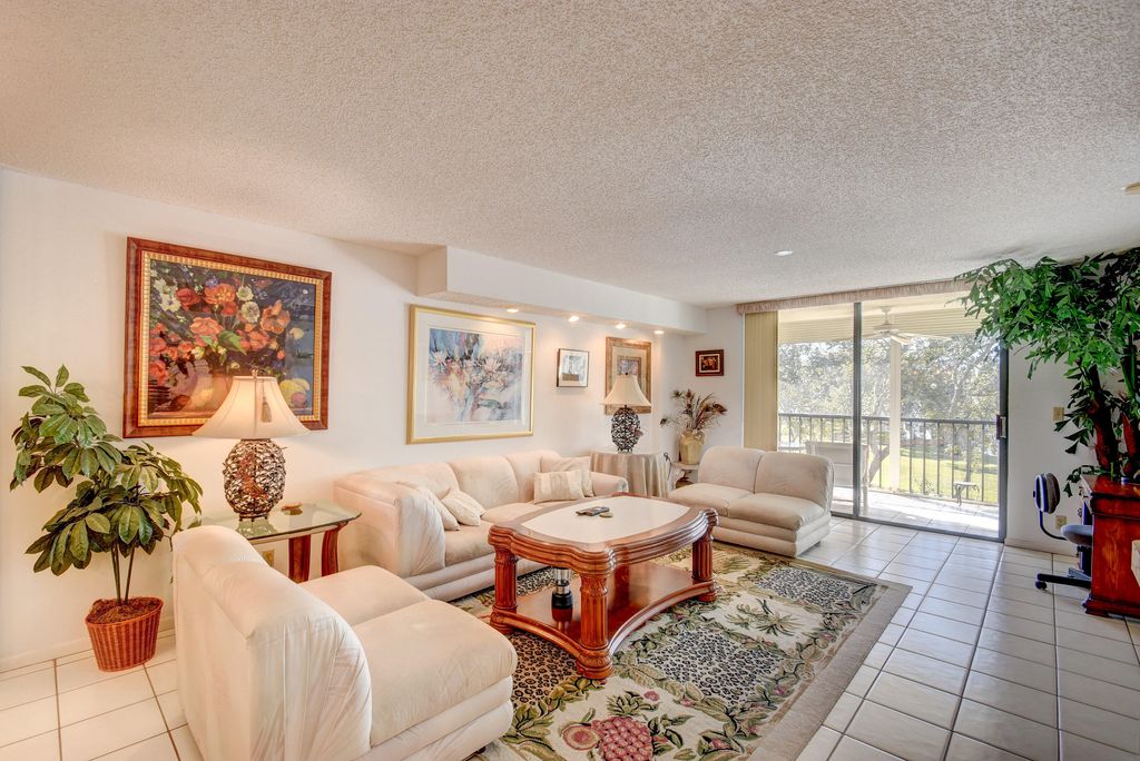 Photo of 15461 Pembridge Drive #309, Delray Beach, FL 33484 (MLS # B26004592)