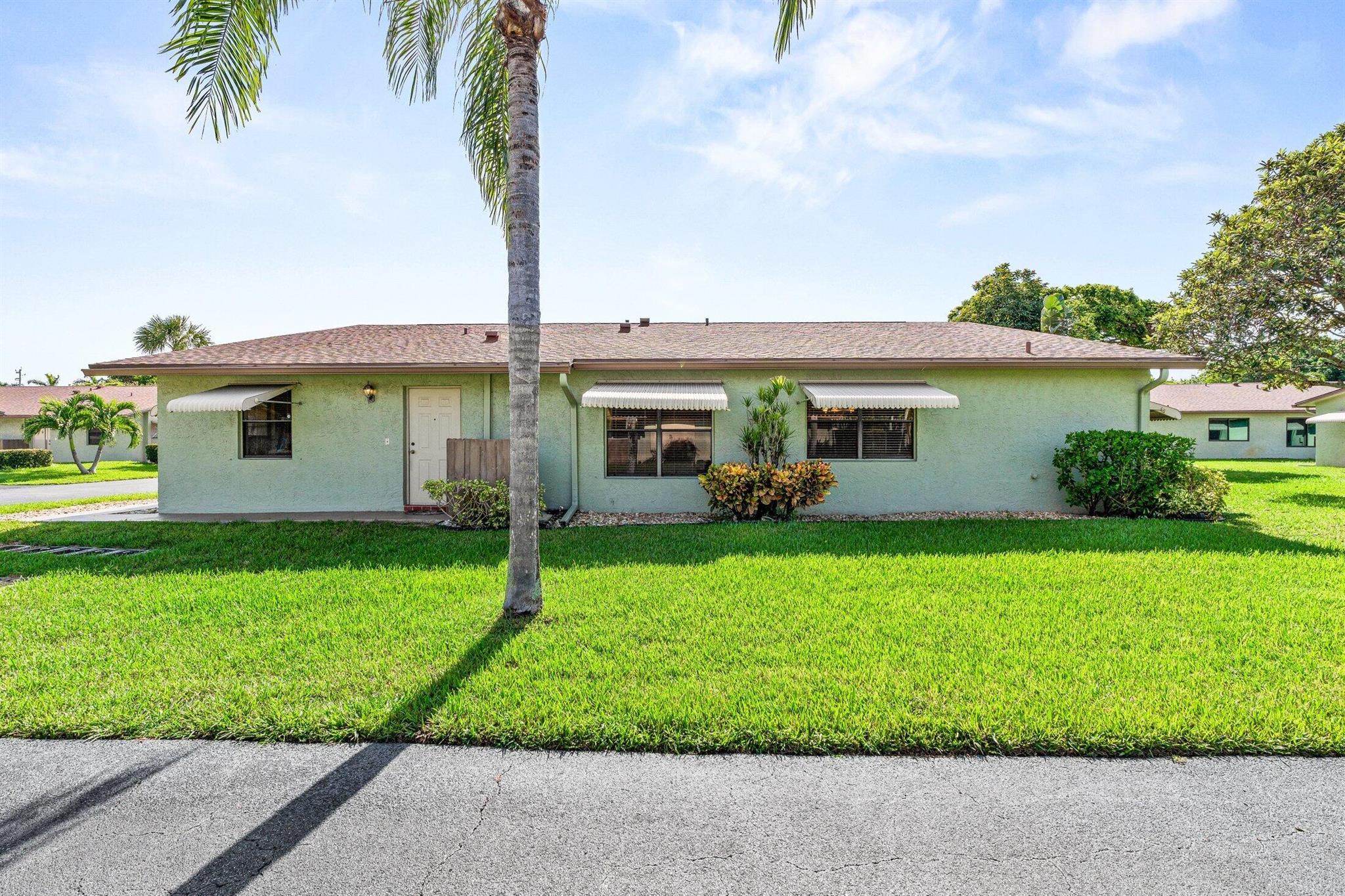 BEST DEAL IN BOYNTON!! LOWEST PRICE IN COMMUNITY! 2/2 VILLA WITH BRAND NEW ROOF, GARAGE AND SCREEN PATIO. AC 5 YRS OLD.. Clean well maintained unit but needs complete updating and is priced accordingly. Renovate exactly how you want it and still be under market value. Chanteclair Villas is an active 55+ comm. Two heated pools and clubhouse. Maintenance is only $470 mo and includes bldg insurance, lawn care, roof and exterior building maintenance, water, cable and internet. It is a condo association. Nice spacious floor plan with split bedrooms. Large walk in closet in master bedroom Eat in kitchen. Full size W/D. Commercial vehicles or motorcycle must be kept in garage. Close to Bethesda hospital, medical offices and the Boynton Tennis Complex. This one won't last long