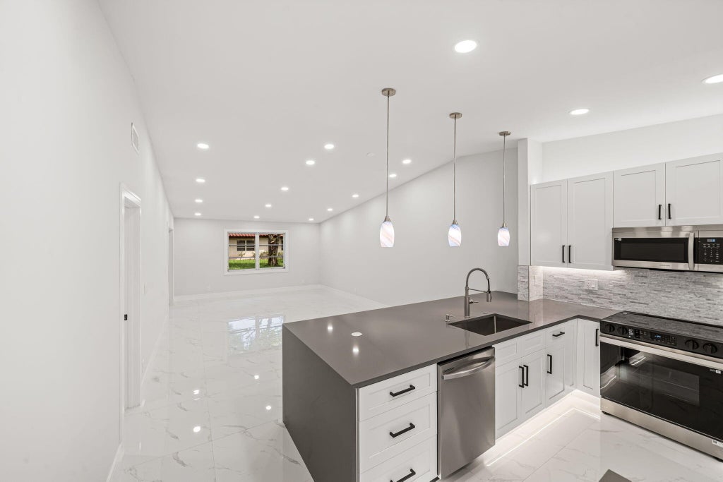 Photo of 6083 MILLINGTON Way #6083, Delray Beach, FL 33484 (MLS # B26071810)