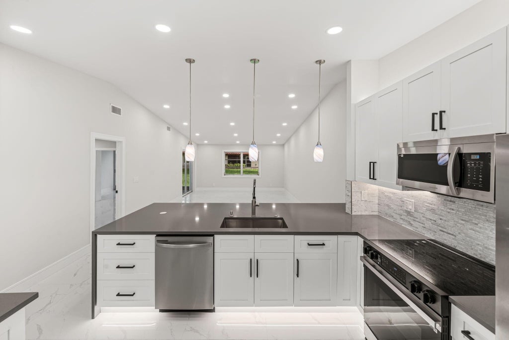 Photo of 6083 MILLINGTON Way #6083, Delray Beach, FL 33484 (MLS # B26071810)
