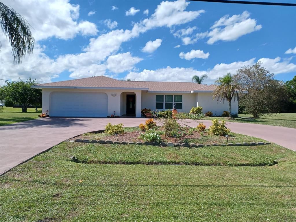 Photo of 2938 SE Bakersfield Street, Port St Lucie, FL 34952 (MLS # R10836883)