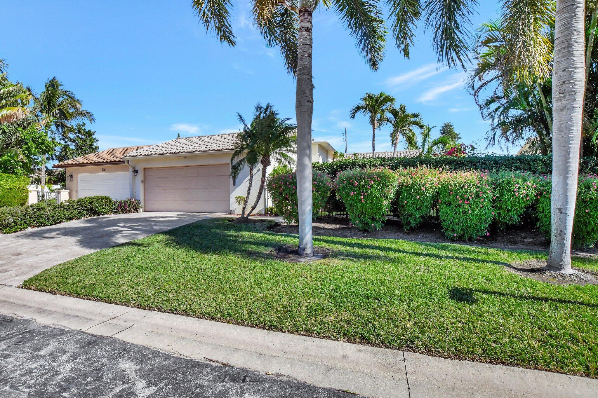 Discover this spectacular 3/2 plus storage room, court-yard style villa with a light-filled center atrium, private pool & 2 car garage with generator hook up. Ideally located close to the Beach & just moments from all the fun, excitement, shopping, dining & vibrant lifestyle that Boca Raton has to offer. Meticulously maintained, this stunning home boast vaulted ceilings in the Living room; impact windows & doors, an updated kitchen with custom cherry cabinets, granite countertops, newer SS appliances & elegant plantation-style window & door treatments. The spacious, covered & screened patio is ideal for entertainment; The open pool is surrounded by brick pavers with fieldstone walkways along with a fenced manicured landscaped yard and a travertine paved driveway.Tucked away in t