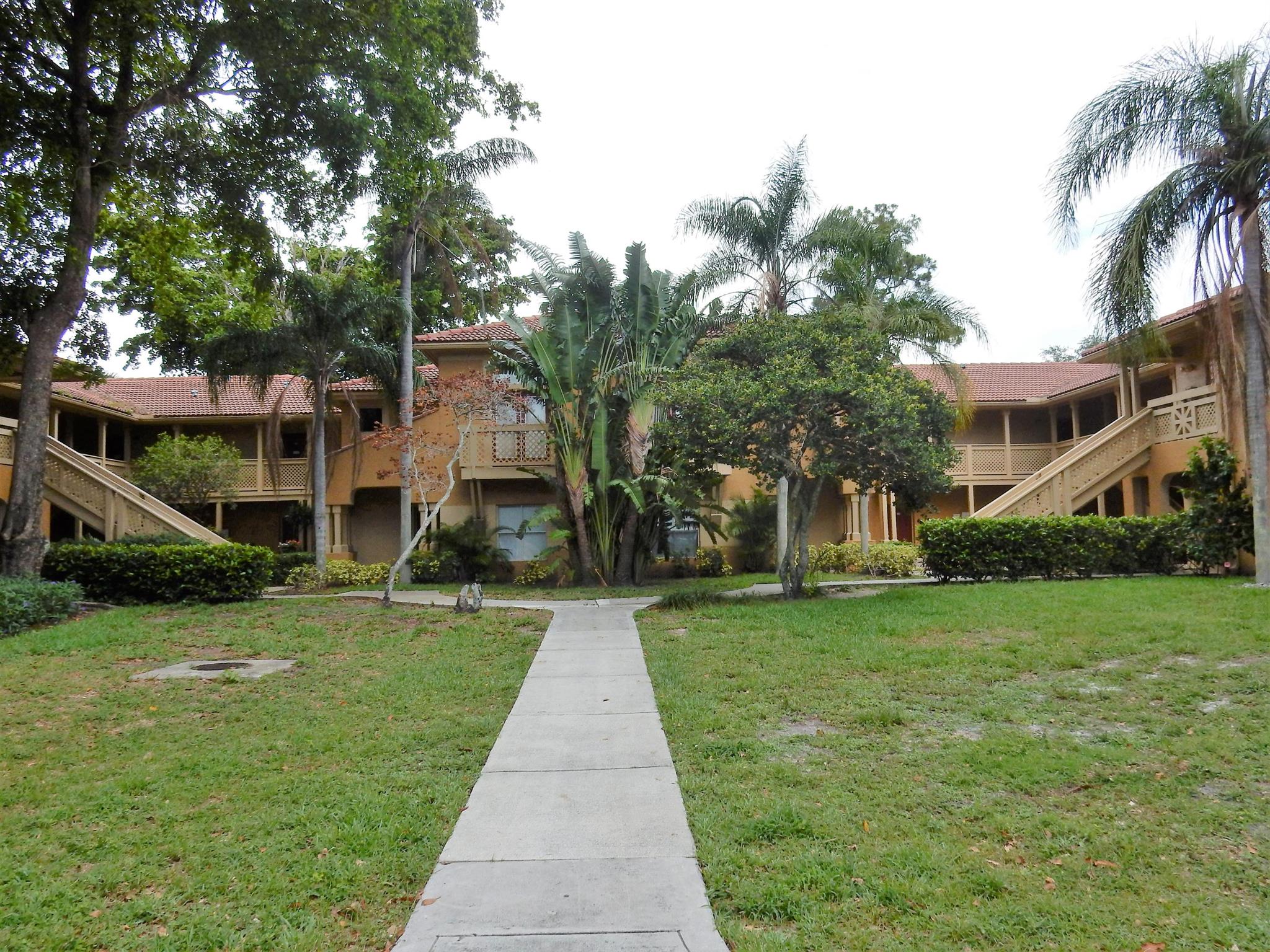 GATED COMMUNITY W/AMENITIES, CONDO HAS VINYL TILE FLOORING, WASHER/DRYER, WATER INCLUDED!