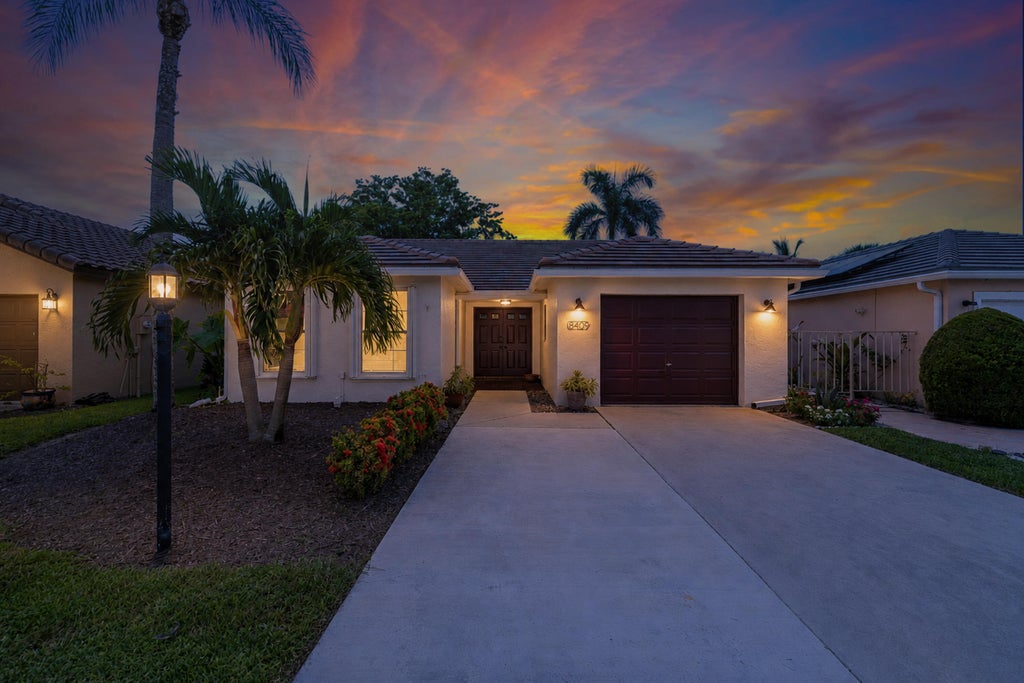 Photo of 8409 Bonita Isle Drive, Lake Worth, FL 33467 (MLS # B26066005)