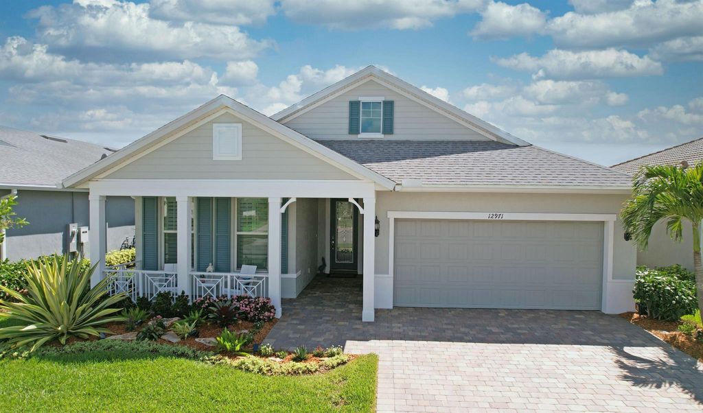 Photo of 12971 SW Aureolian Lane, Port Saint Lucie, FL 34987 (MLS # R10999320)
