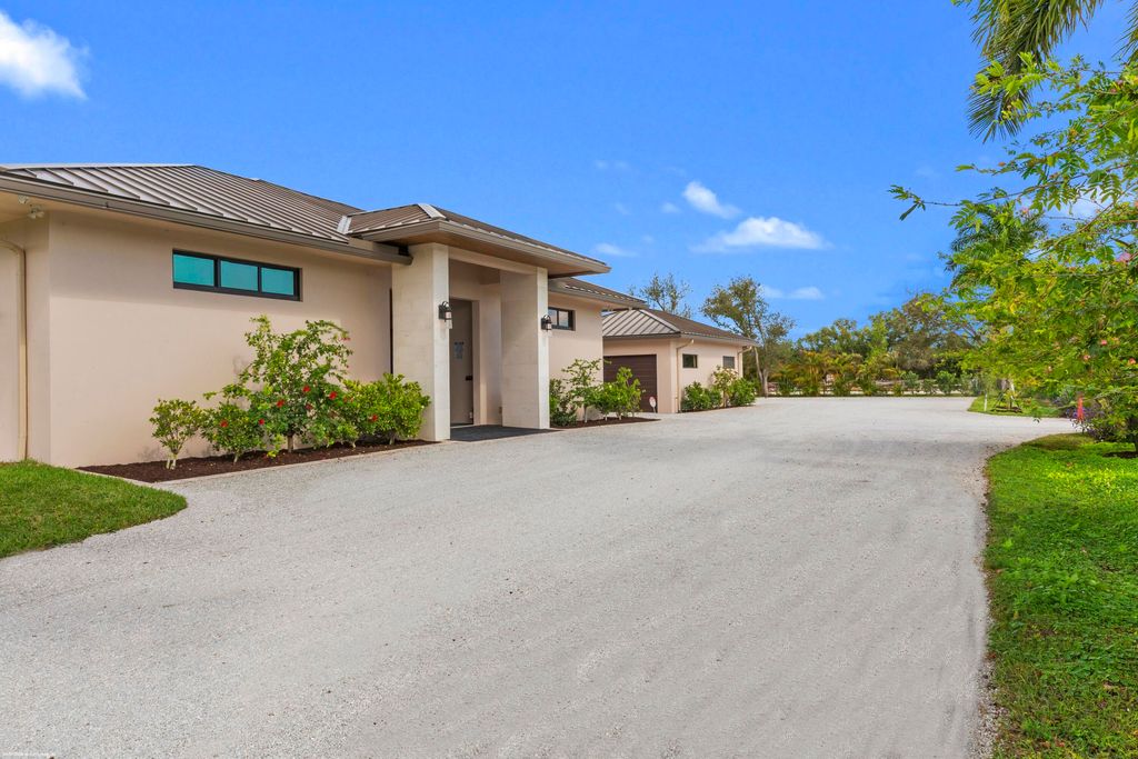 Photo of 16219 Hollow Tree Lane, Wellington, FL 33470 (MLS # R11160070)