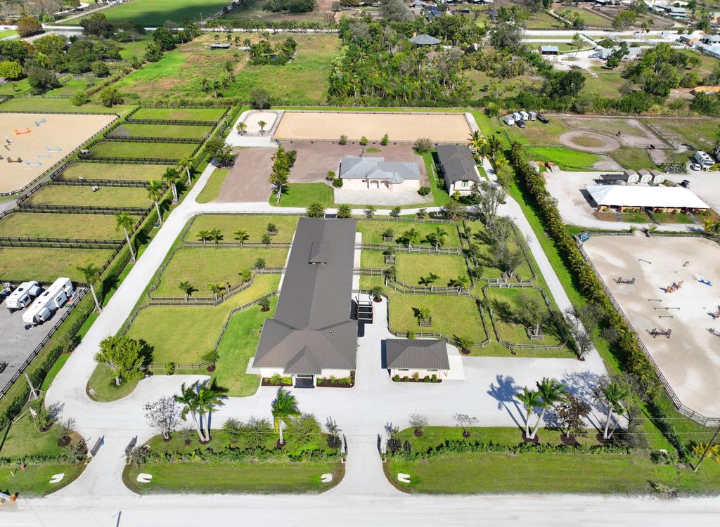 Photo of 16219 Hollow Tree Lane, Wellington, FL 33470 (MLS # R11160070)